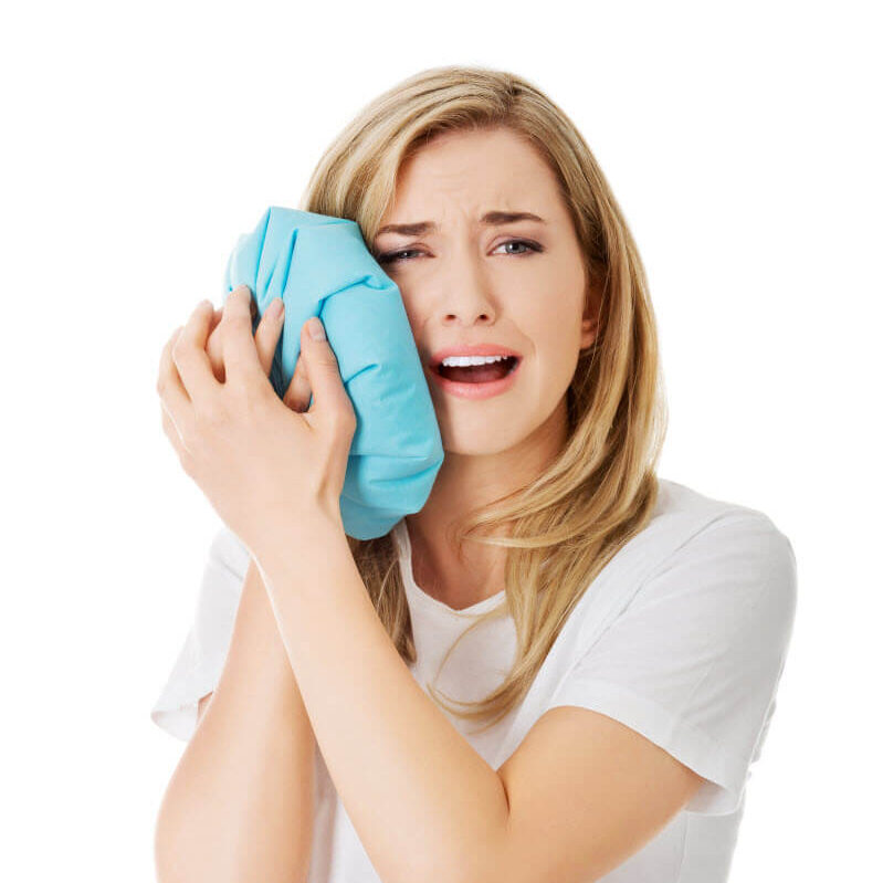 Dentist treating patient in Branford CT