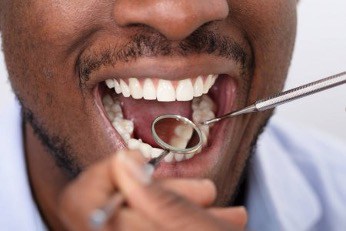 Dentist treating patient in Branford CT