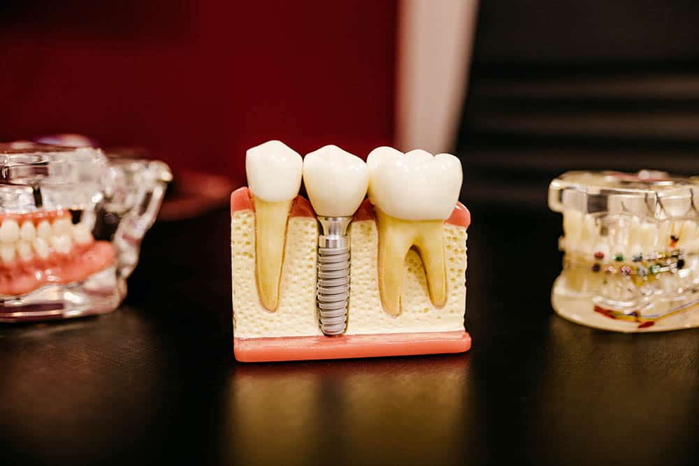 Dentist treating patient in Branford CT